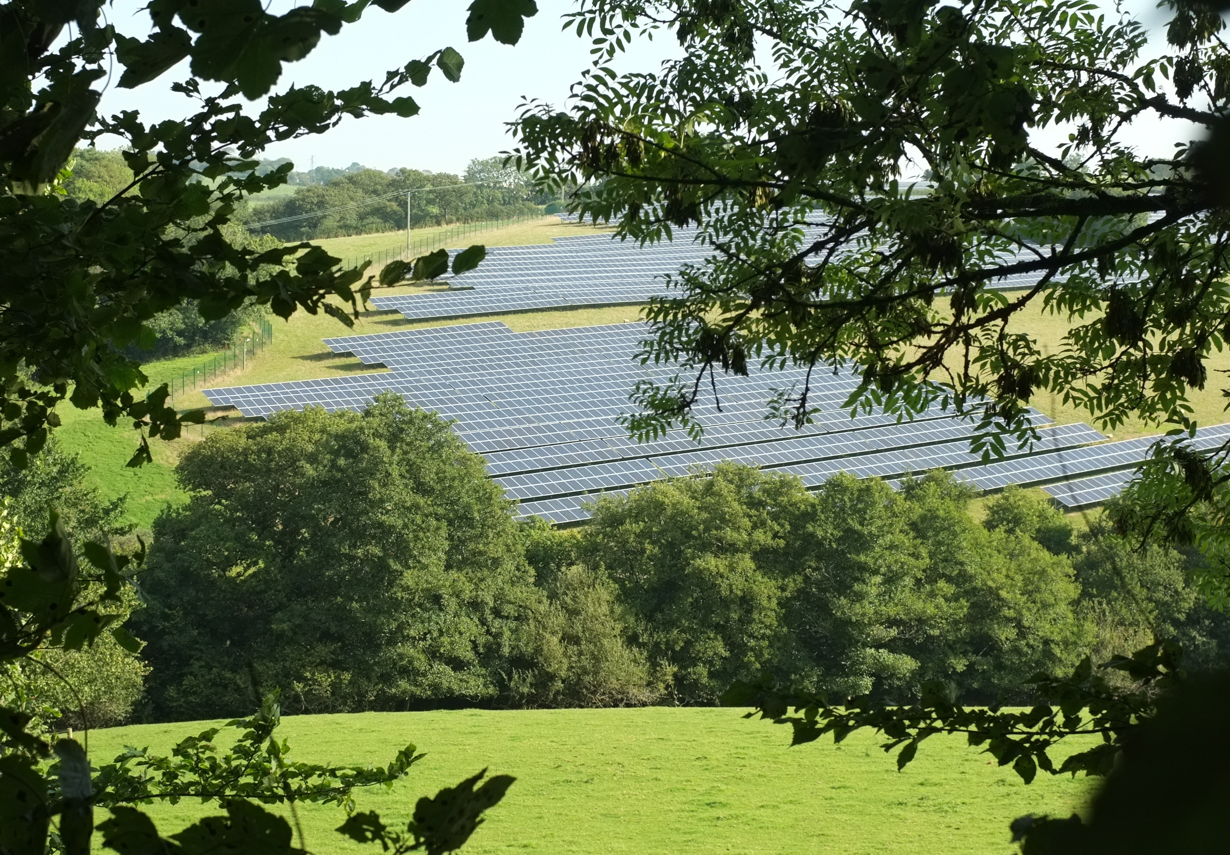 Pensipple Solar Farm extending across a Cornish valley at St Keyne
